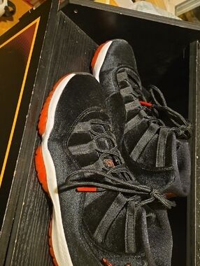 Jordan 11 Retro  Black and Red Mid-Top Sneakers